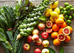 a group of fruits and vegetables on a wood surface Healthy Weight Loss Diets Baillieston